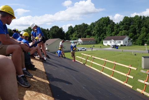 Taking a break after finishing the tarpaper. Most of the tarpaper down.